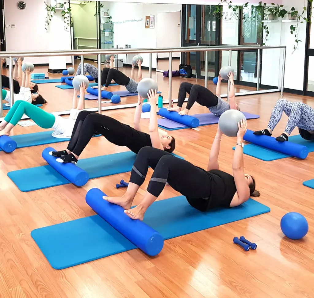 Matwork Bridging Course - Self-Paced | The Pilates League matwork pilates in a studio