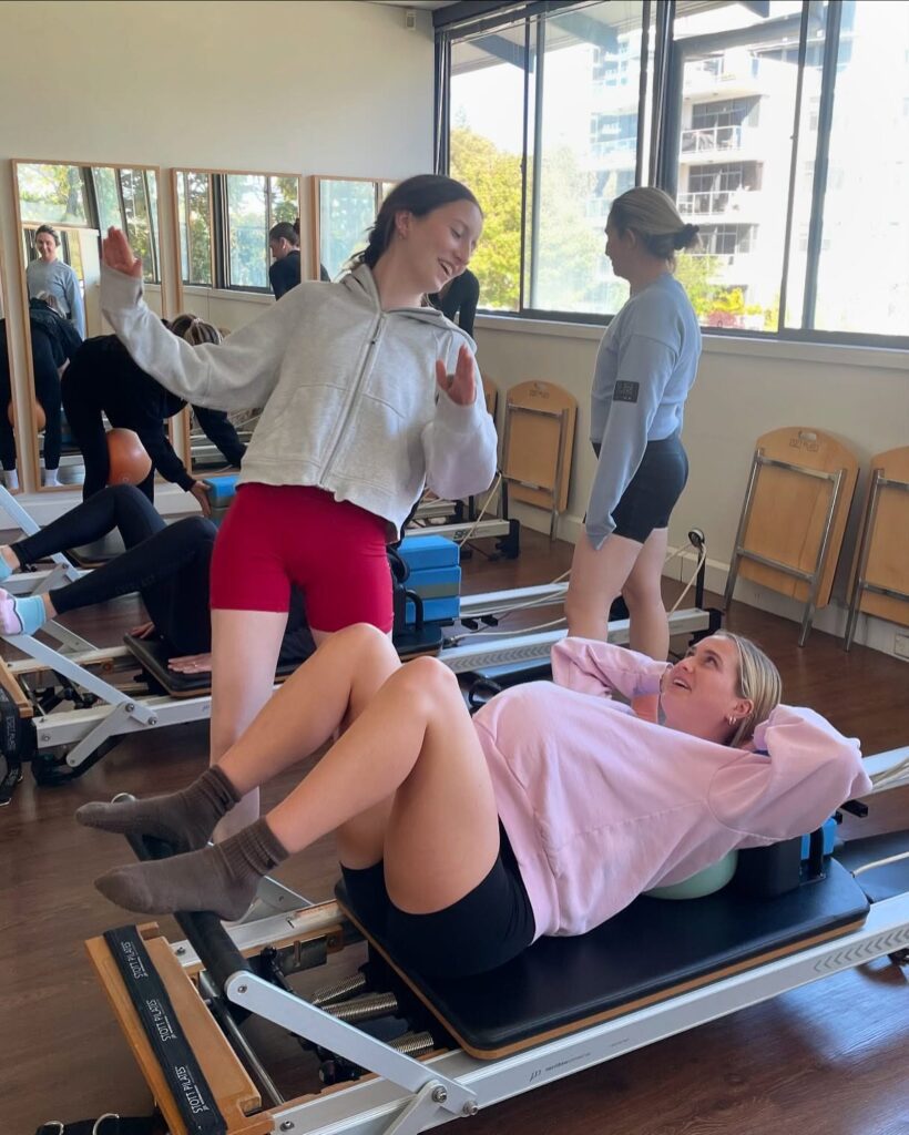 2 women enjoying pilates