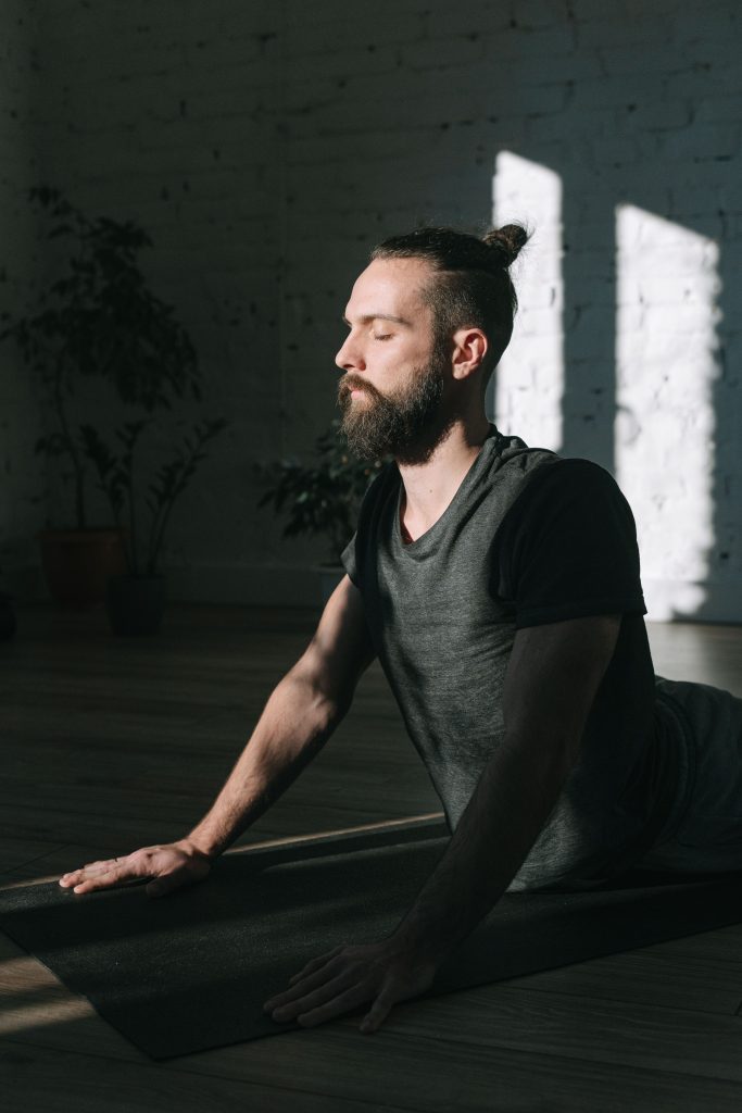 Pilates for Men | The Pilates League man doing pilates
